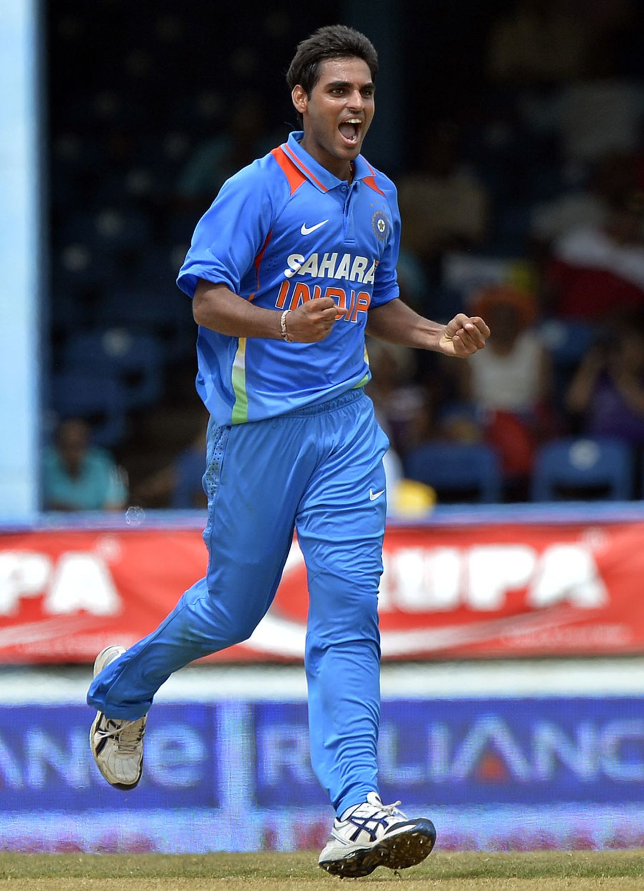 Bhuvneshwar Kumar exults after picking up a wicket, India v Sri Lanka, tri-series final, Port-of-Spain, July 11, 2013