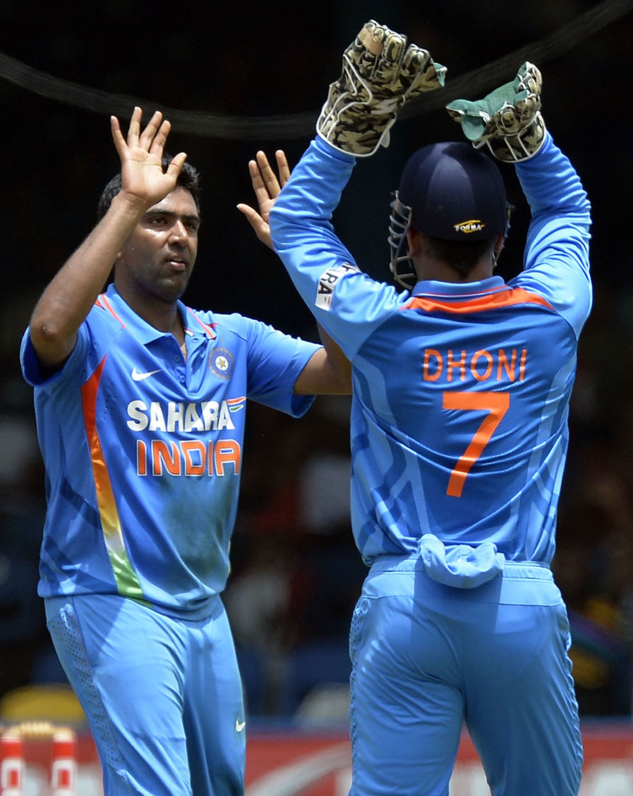 R Ashwin celebrates his double-strike with MS Dhoni, India v Sri Lanka, tri-series final, Port-of-Spain, July 11, 2013