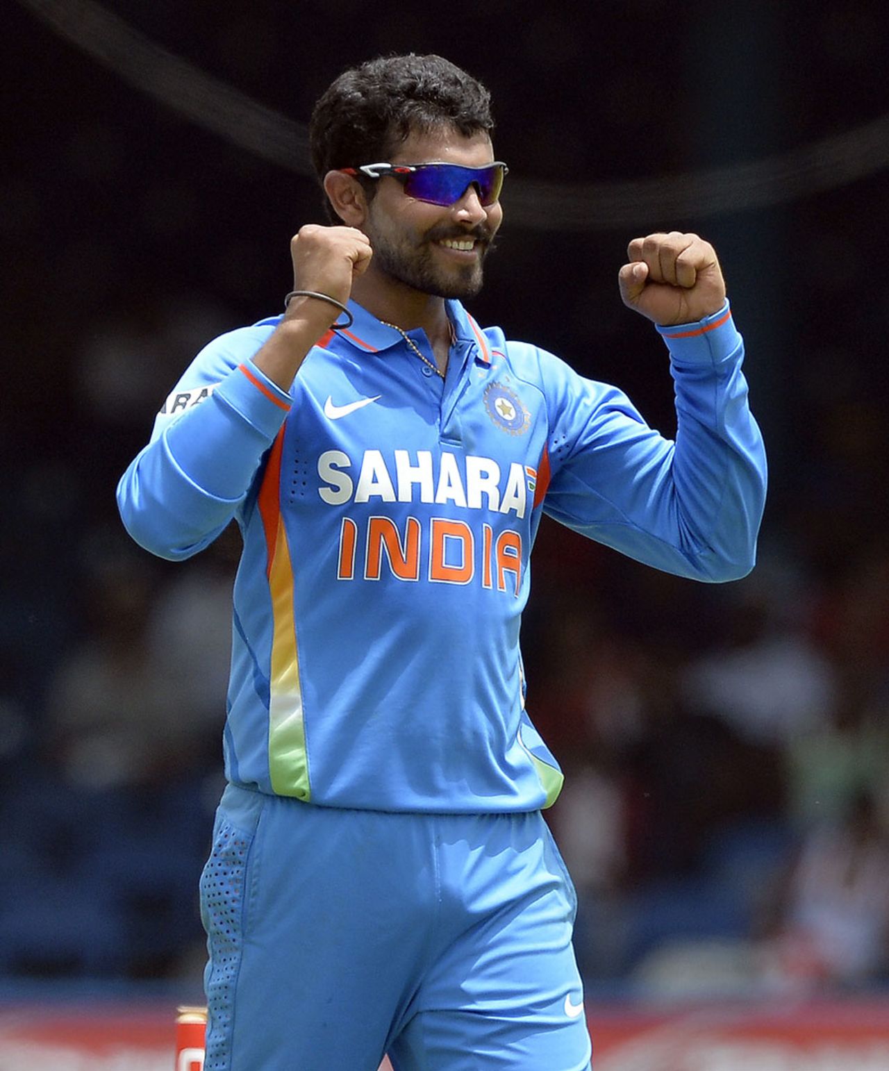 Ravindra Jadeja is all smiles after picking a wicket, India v Sri Lanka, tri-series final, Port-of-Spain, July 11, 2013
