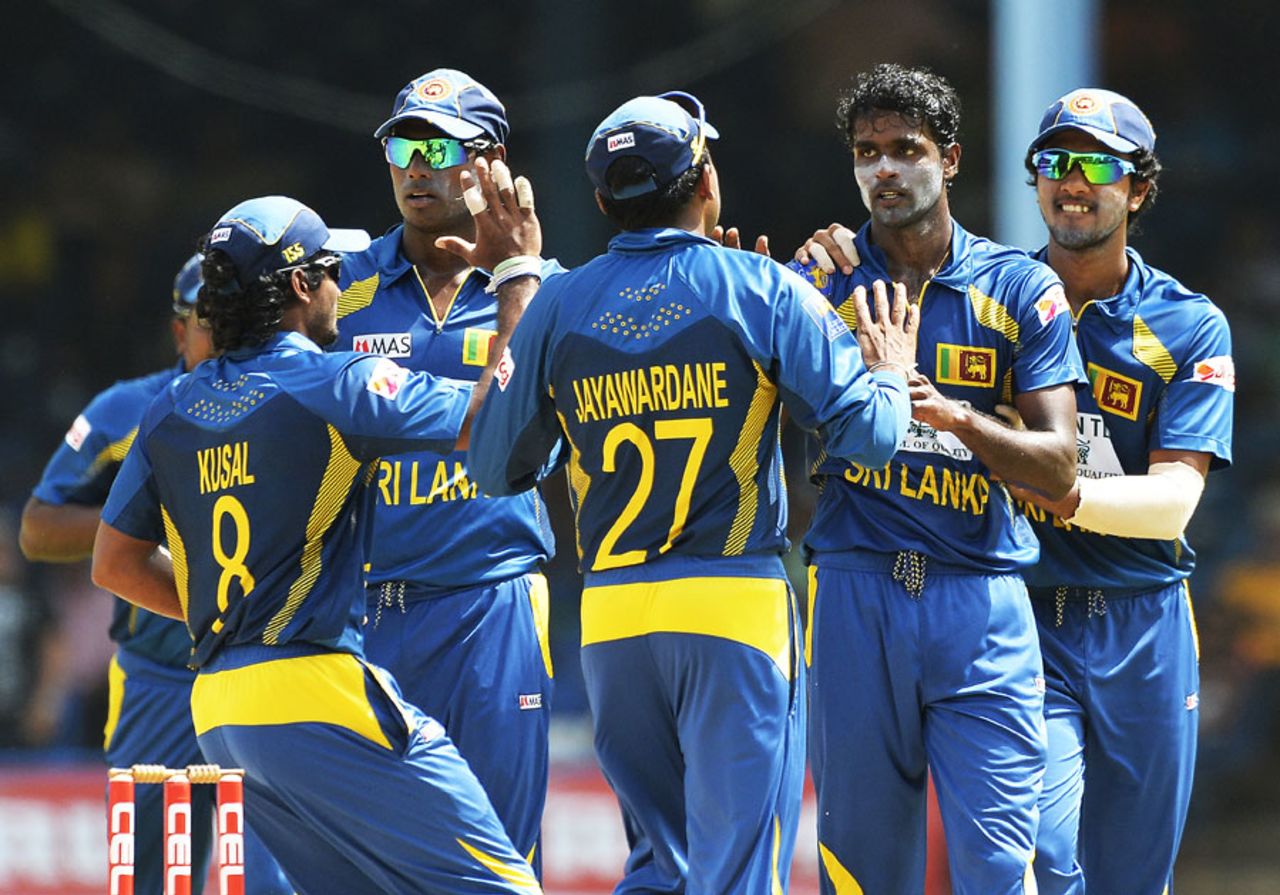 Shaminda Eranga celebrates the wicket of Shikhar Dhawan, India v Sri Lanka, tri-series final, Port-of-Spain, July 11, 2013