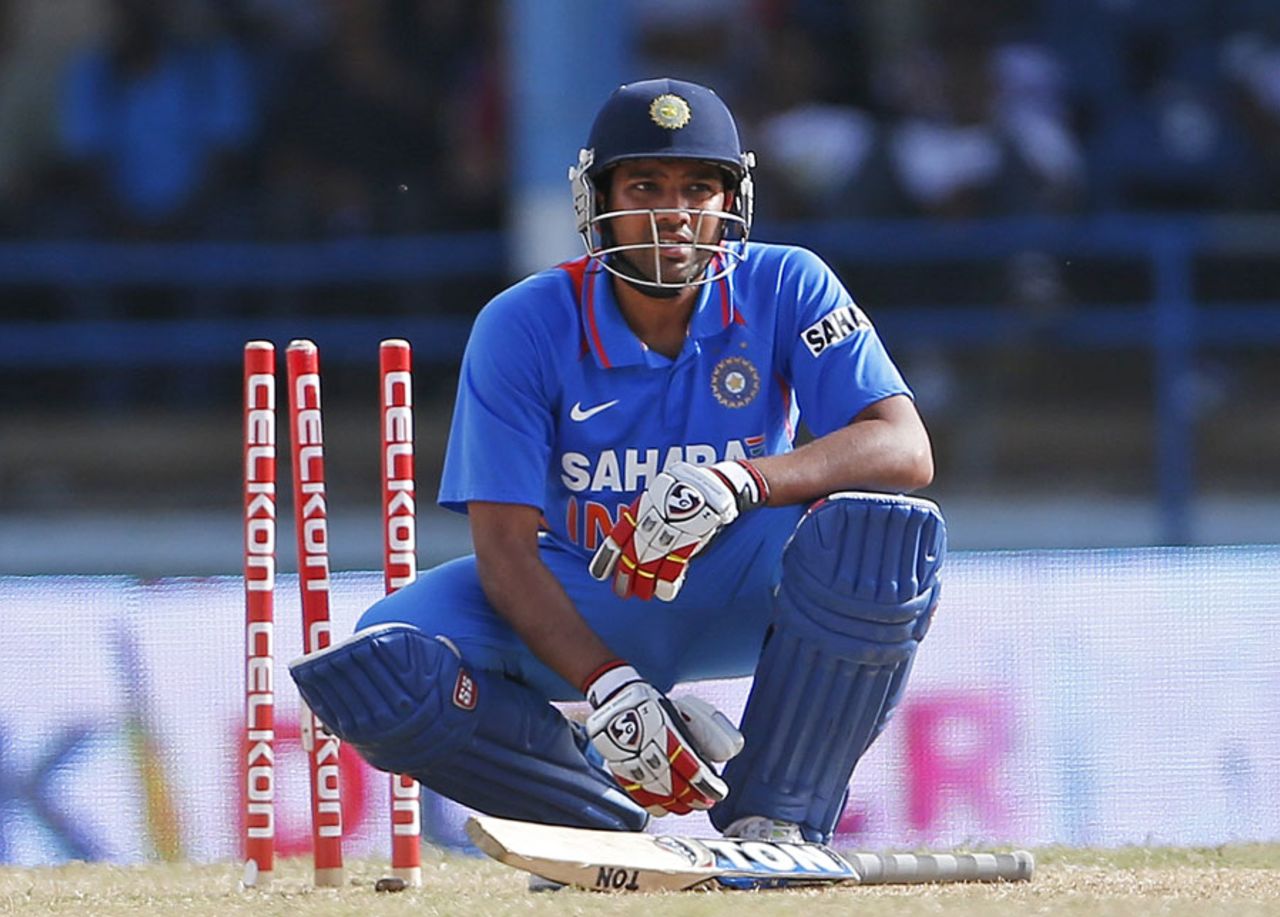 Rohit Sharma after being bowled by a delivery that didn't rise much, India v Sri Lanka, tri-series final, Port-of-Spain, July 11, 2013