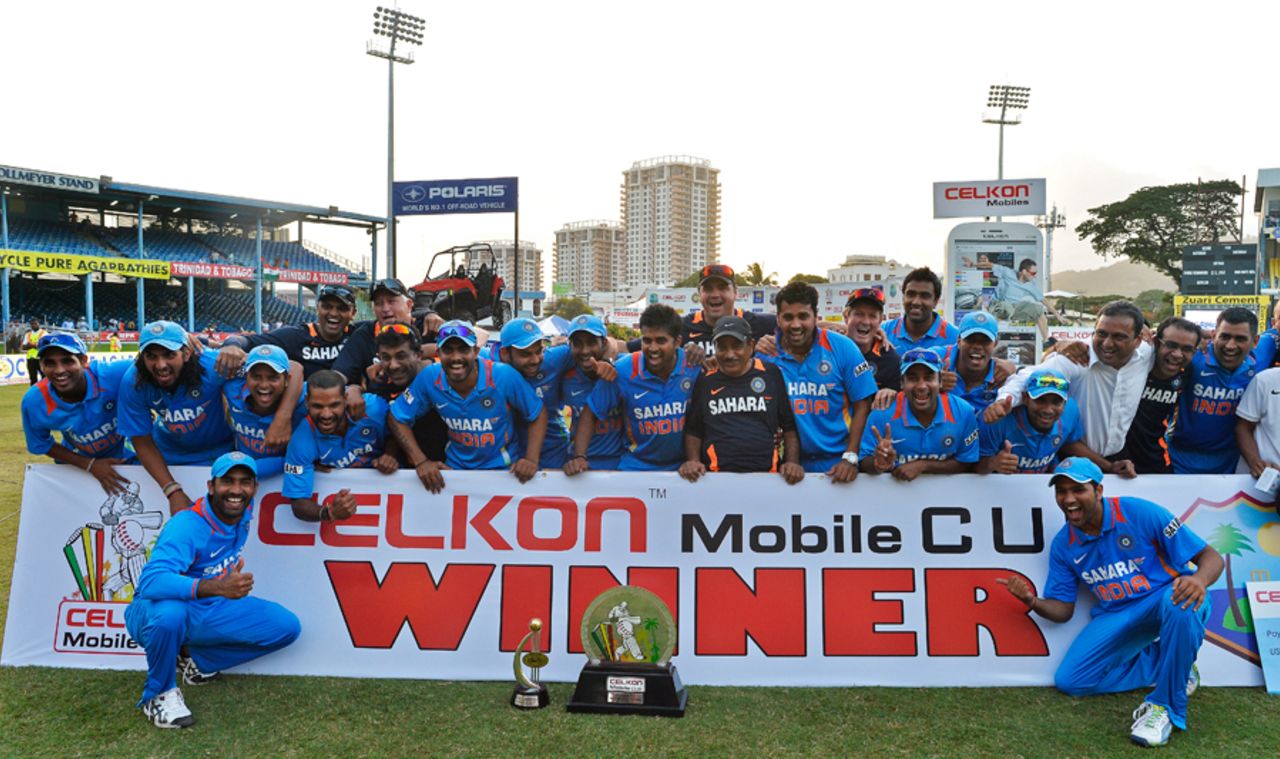 India celebrate with their spoils, India v Sri Lanka, tri-series final, Port-of-Spain, July 11, 2013