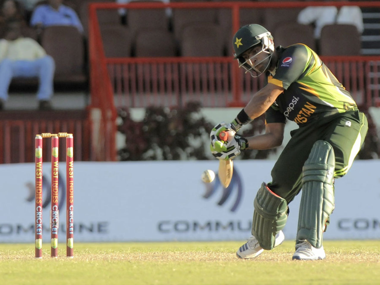 Umar Akmal makes room for himself to hit the ball through the off side, West Indies v Pakistan, 2nd ODI, Providence, July 16, 2013