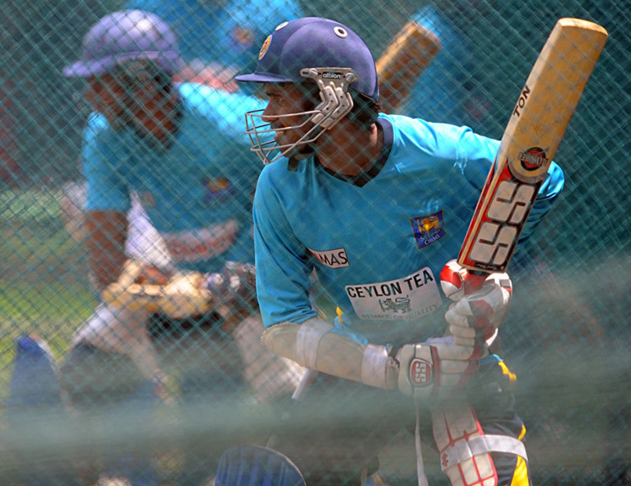 Upul Tharanga gets into position during a nets session, Colombo, July 18, 2013