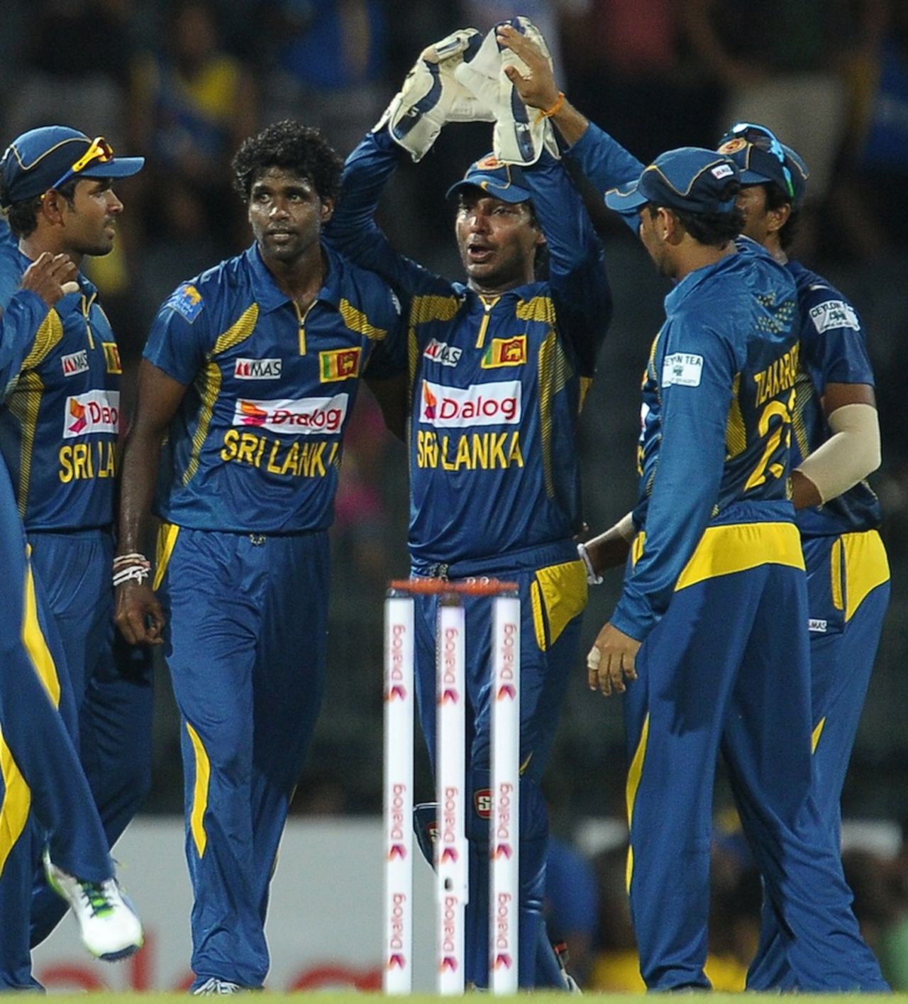 Shaminda Eranga celebrates JP Duminy's wicket with team-mates, Sri Lanka v South Africa, 1st ODI, Colombo, July 20, 2013