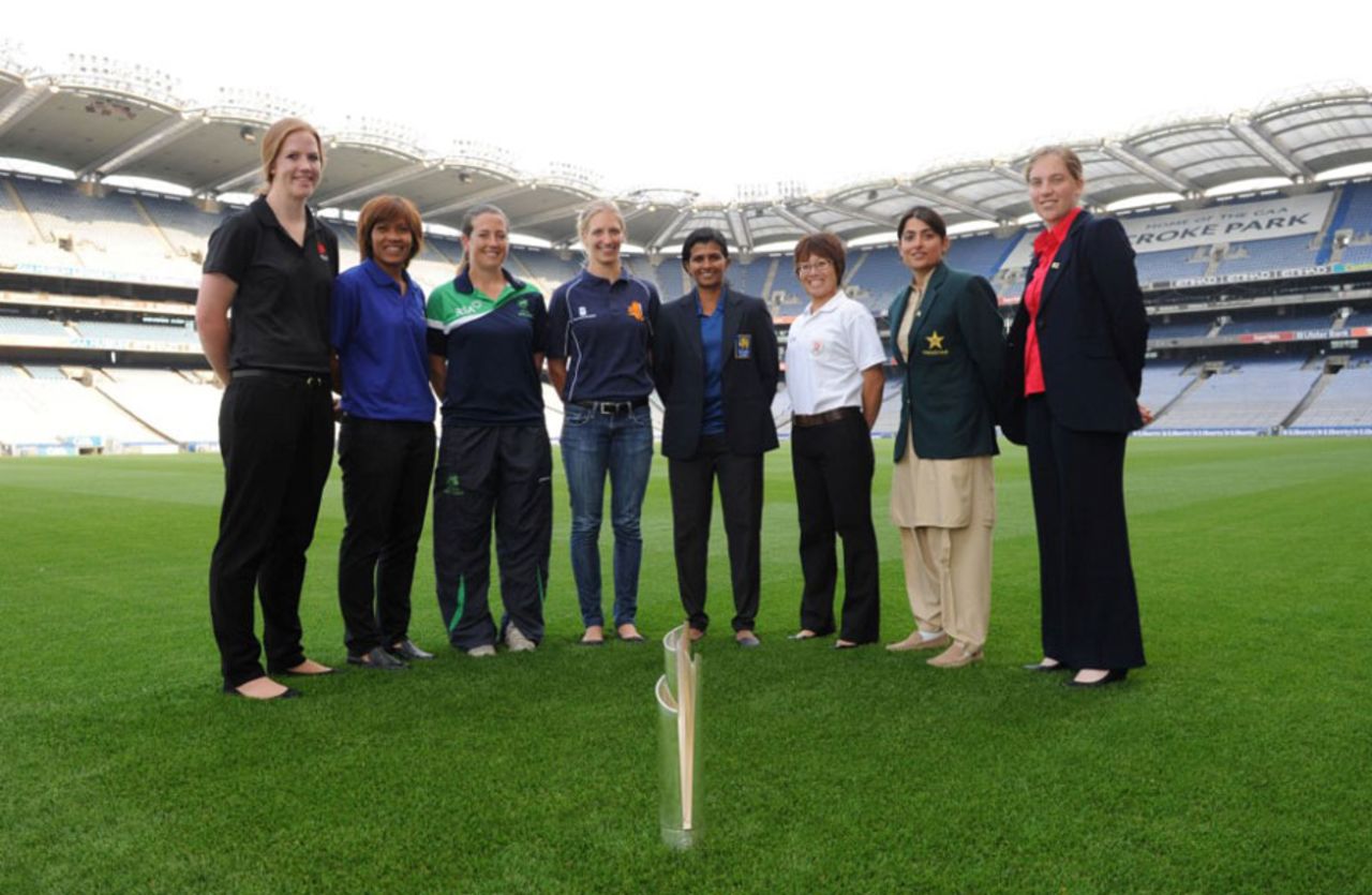 The eight captains with the Women's World T20 Qualifiers Trophy, Croke Park Stadium, Dublin, July 23, 2013