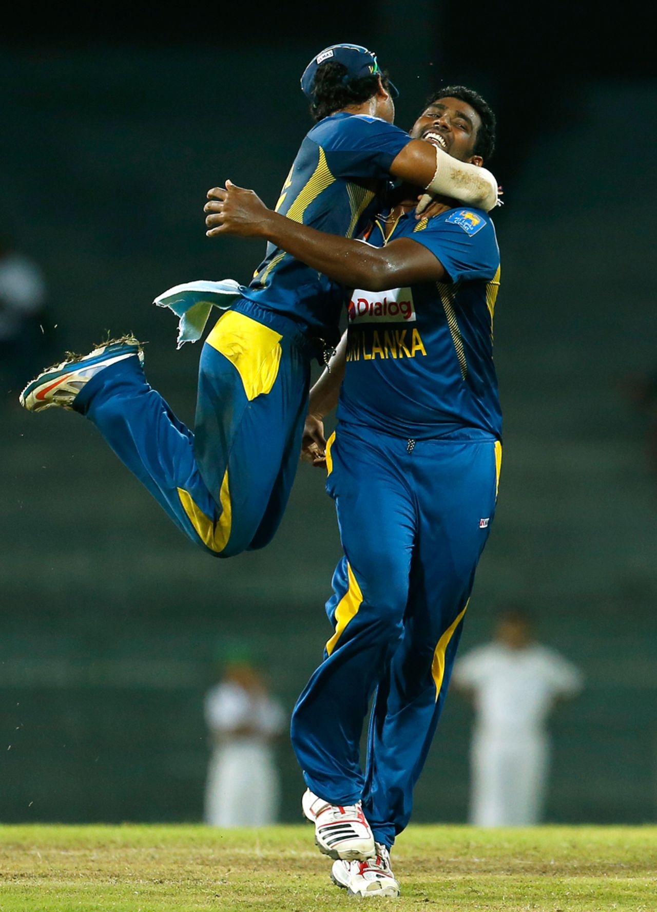 Dinesh Chandimal and Thisara Perera are ecstatic with JP Duminy's wicket, Sri Lanka v South Africa, 2nd ODI, Colombo, July 23, 2013