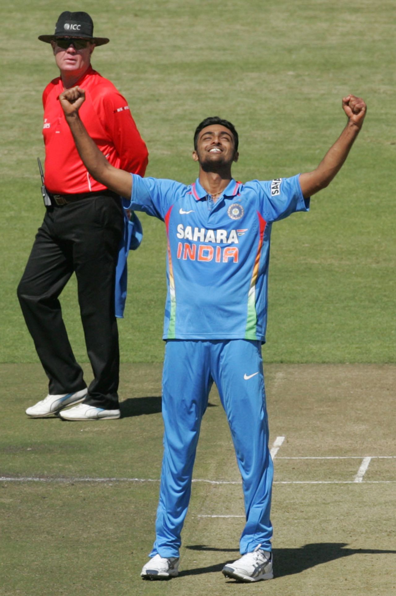 Jaydev Unadkat is elated after picking up his first ODI wicket, Zimbabwe v India, 1st ODI, Harare, July 24, 2013
