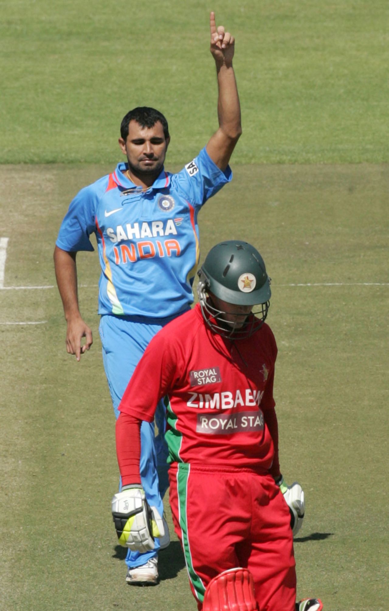 Mohammad Shami celebrates the dismissal of Malcolm Waller, Zimbabwe v India, 1st ODI, Harare, July 24, 2013