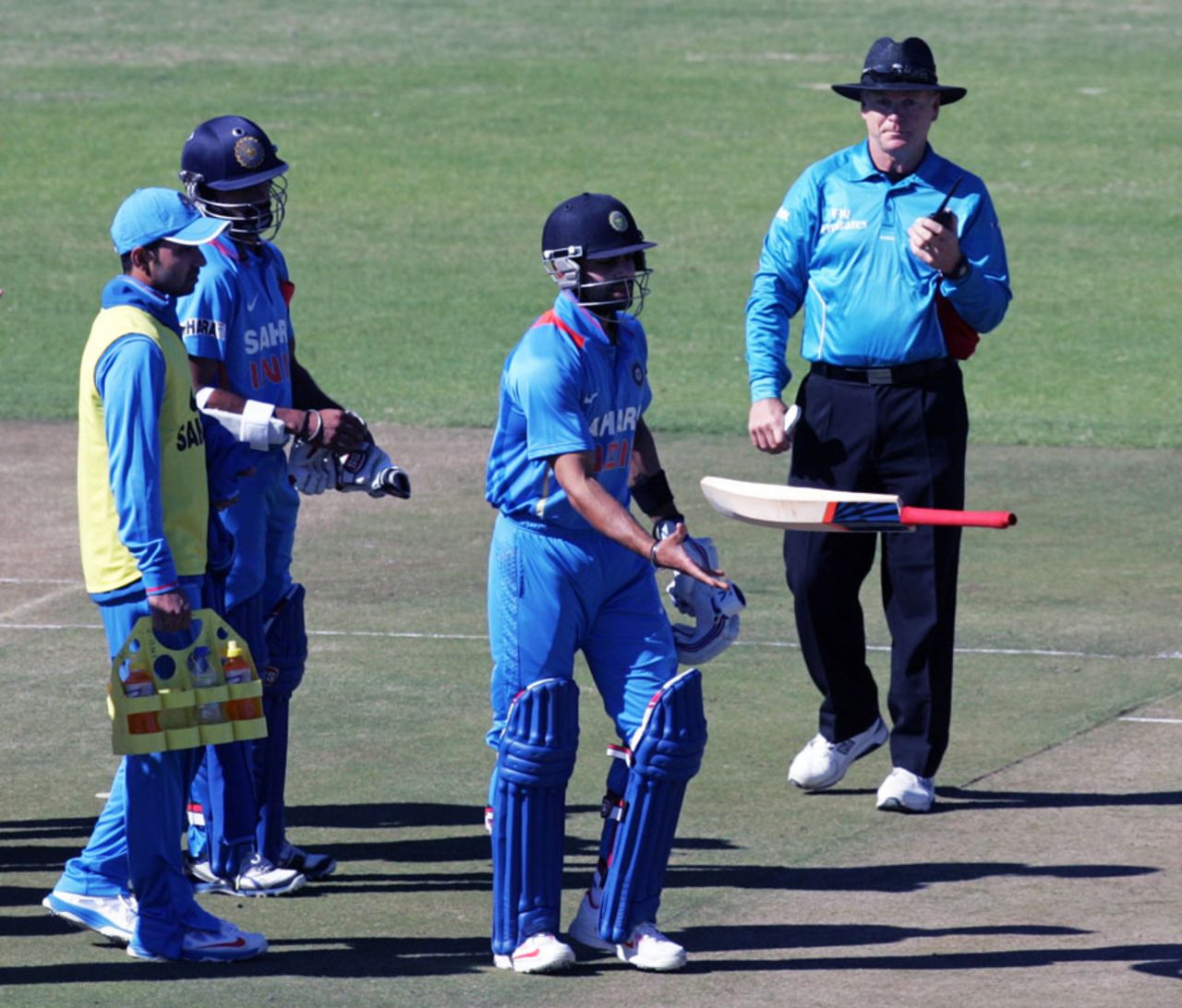 Virat Kohli tosses his bat in disappointment after being given out, Zimbabwe v India, 2nd ODI, Harare, July 26, 2013