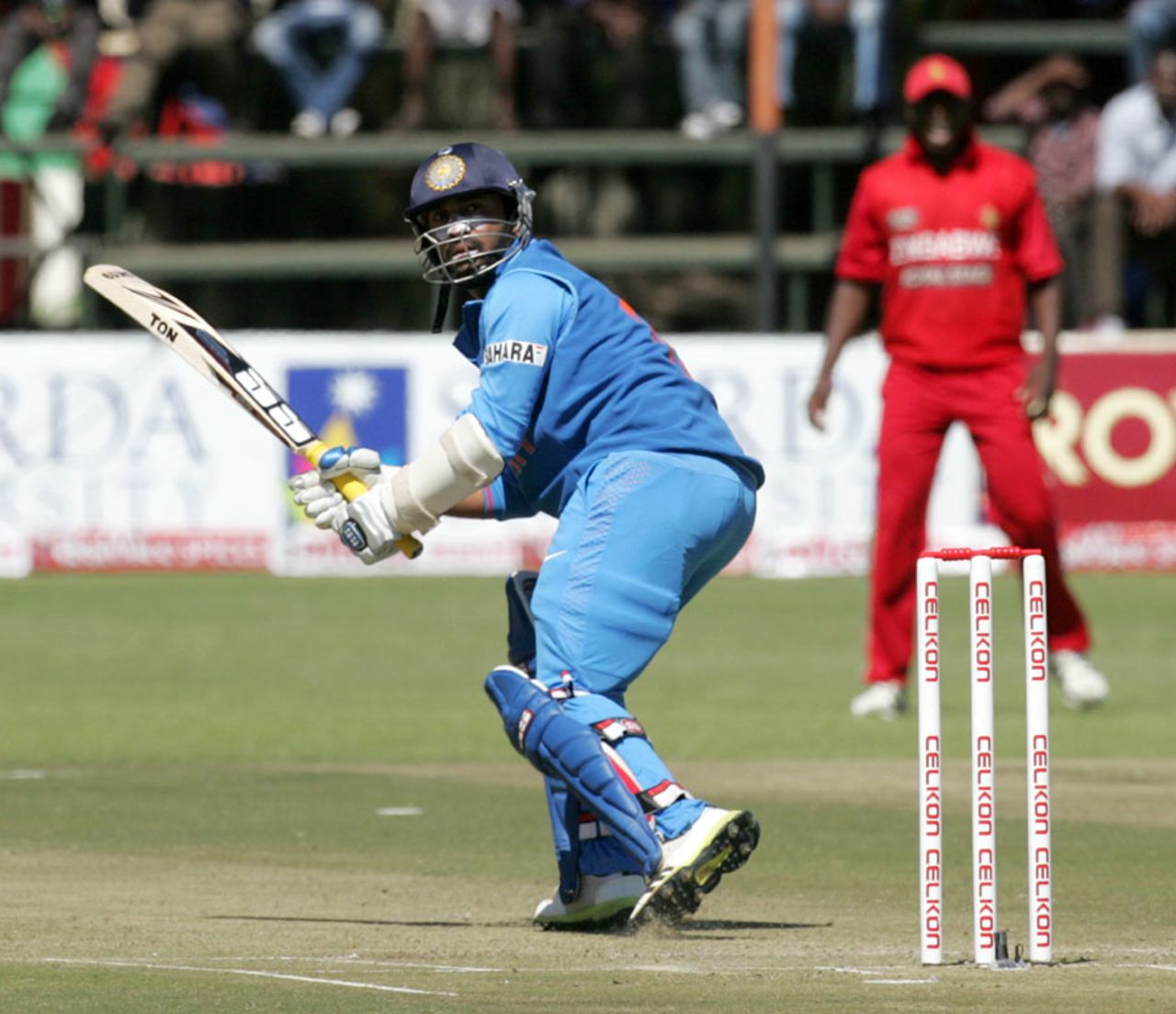 Dinesh Karthik nudges the ball down leg side, Zimbabwe v India, 2nd ODI, Harare, July 26, 2013
