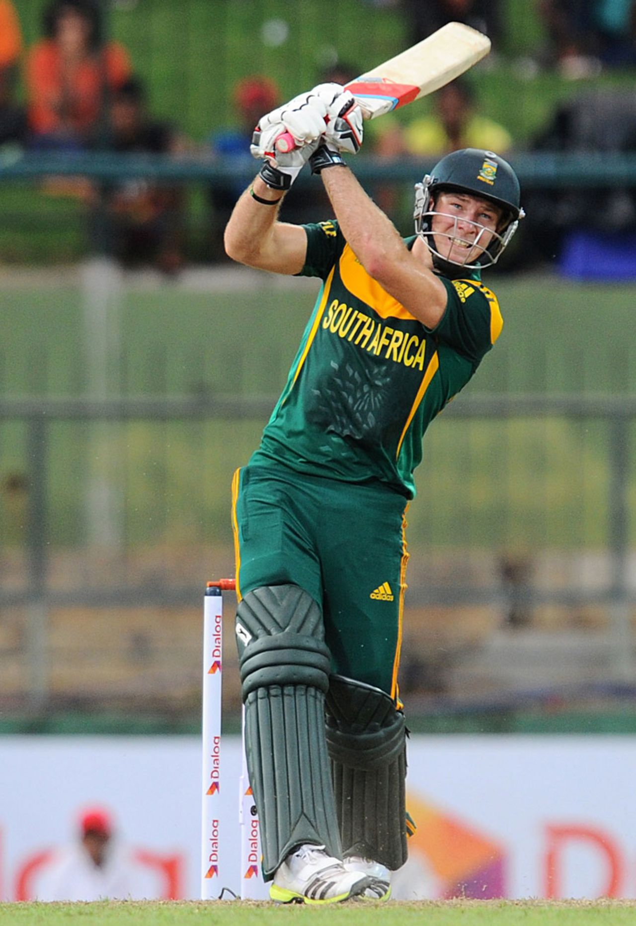 David Miller launches into a lofted shot, Sri Lanka v South Africa, 3rd ODI, Pallekele, July 26, 2013
