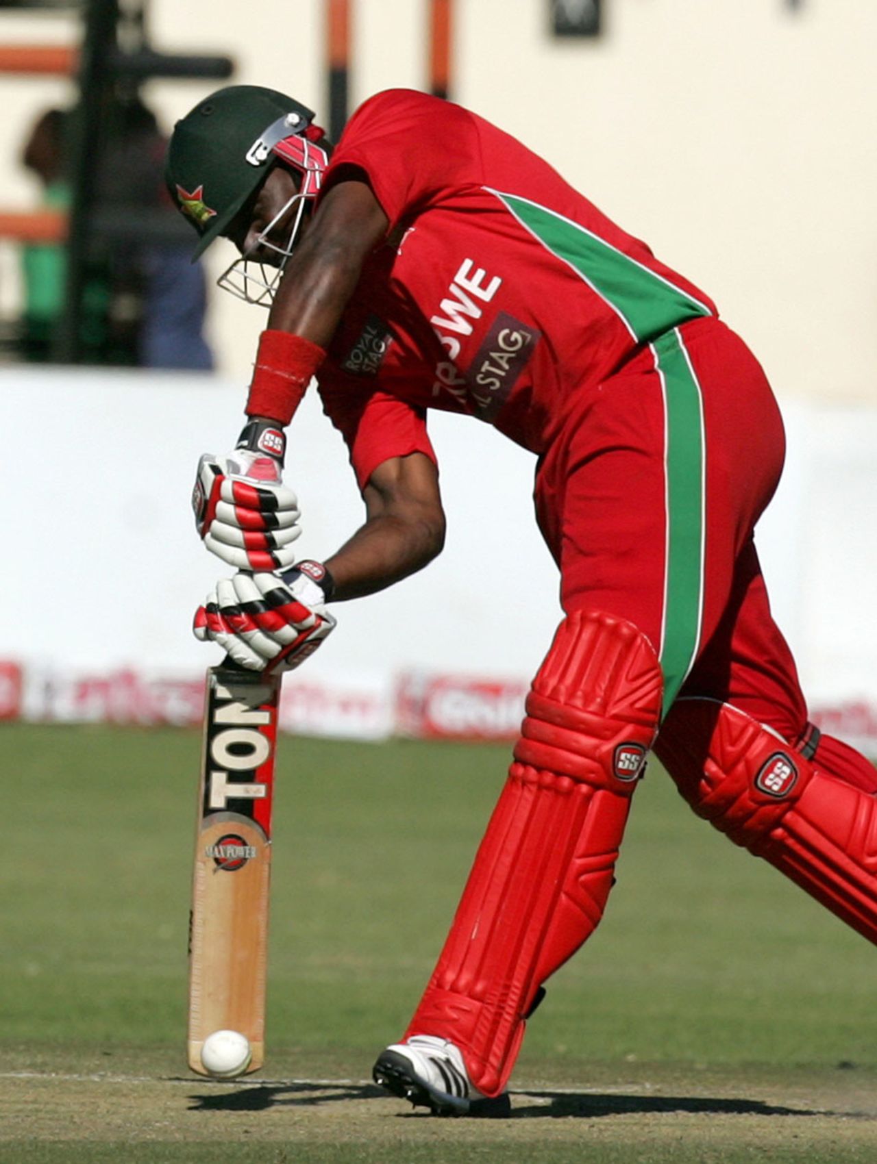 Hamilton Masakadza plays a shot off the front foot, Zimbabwe v India, 2nd ODI, Harare, July 26, 2013