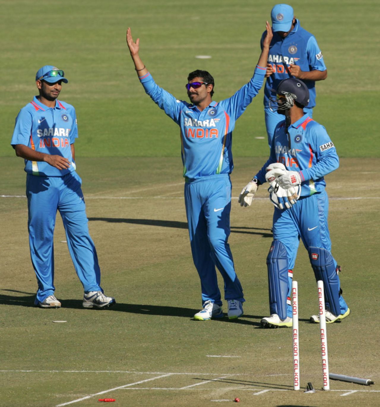 Ravindra Jadeja celebrates the wicket of Sean Williams with his team-mates, Zimbabwe v India, 2nd ODI, Harare, July 26, 2013