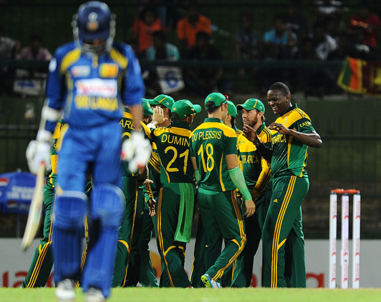 The South Africa team celebrate the wicket of Upul Tharanga, Sri Lanka v South Africa, 3rd ODI, Pallekele, July 26, 2013
