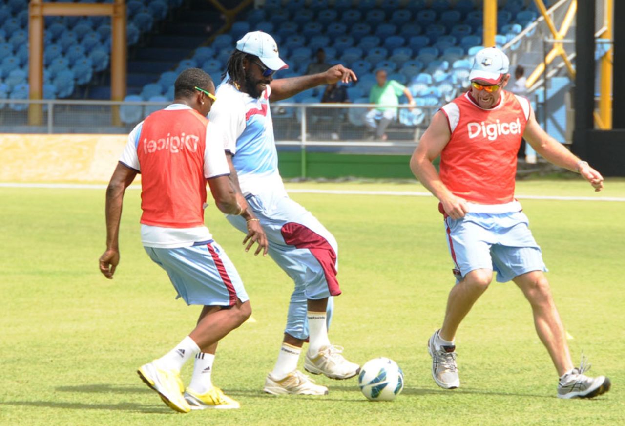 West Indies players take time for a game of football at a practice session, St Vincent, July 25, 2013
