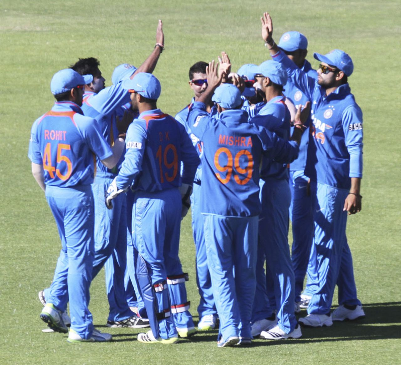 Indian players celebrate the wicket of Vusi Sibanda, Zimbabwe v India, 3rd ODI, Harare, July 28, 2013