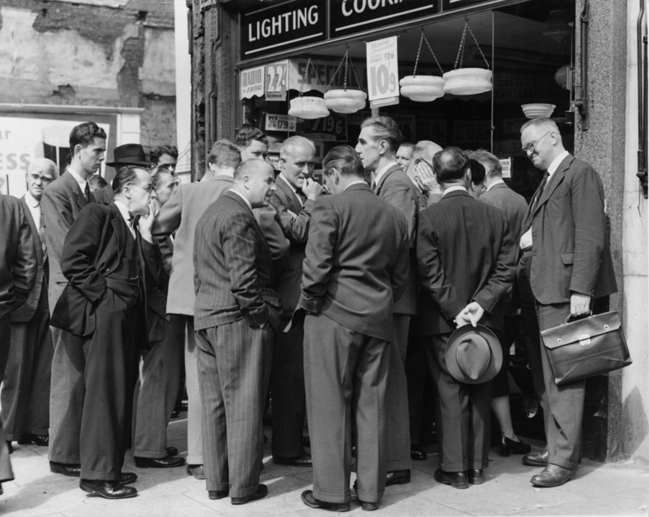 Crowds gather outside a radio shop in High Holborn listening to Test match broadcasts from The Oval, England v Australia, 5th Test, 4th day, August 19, 1953