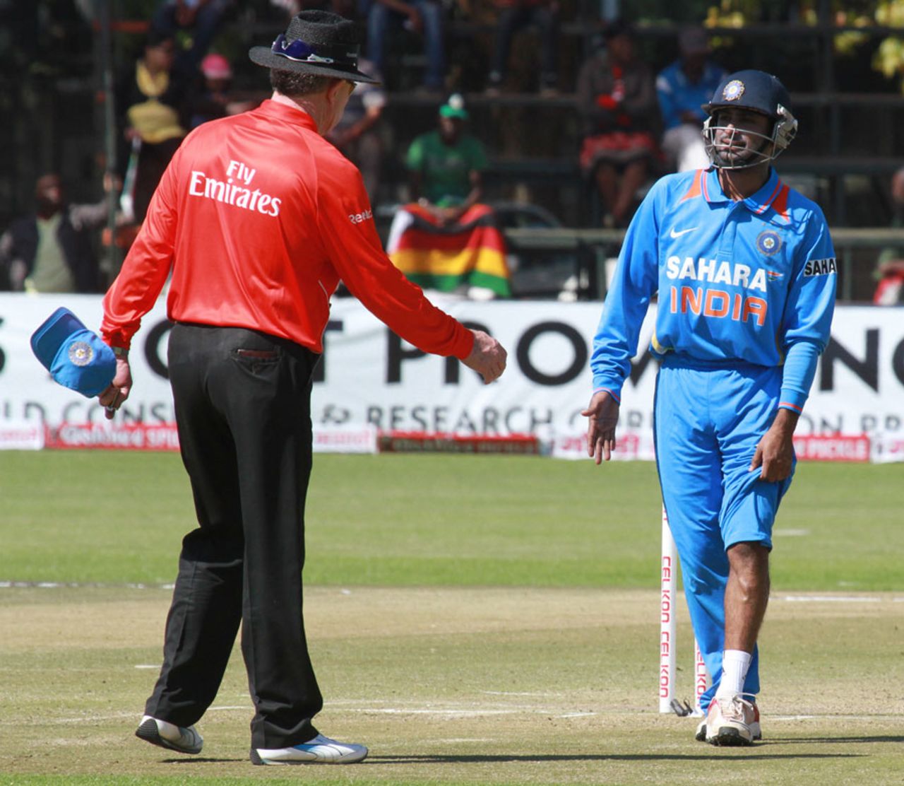 Ambati Rayudu was struck by a drive at silly point, Zimbabwe v India, 3rd ODI, Harare, July 28, 2013