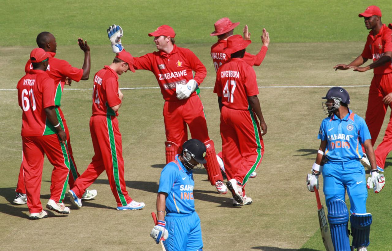 Zimbabwe celebrate the wicket of Rohit Sharma, Zimbabwe v India, 3rd ODI, Harare, July 28, 2013
