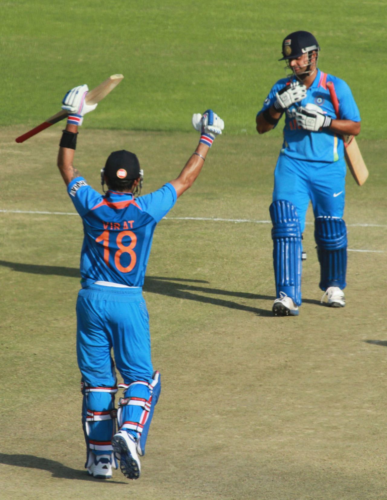 Virat Kohli and Suresh Raina celebrate India's victory, Zimbabwe v India, 3rd ODI, Harare, July 28, 2013