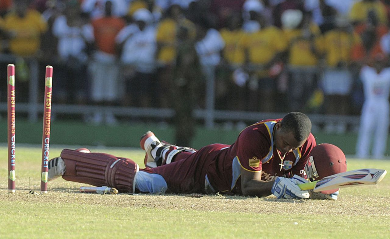 Christopher Barnwell dives but cannot avoid a run out, West Indies v Pakistan, 2nd T20I, St Vincent, July 28, 2013