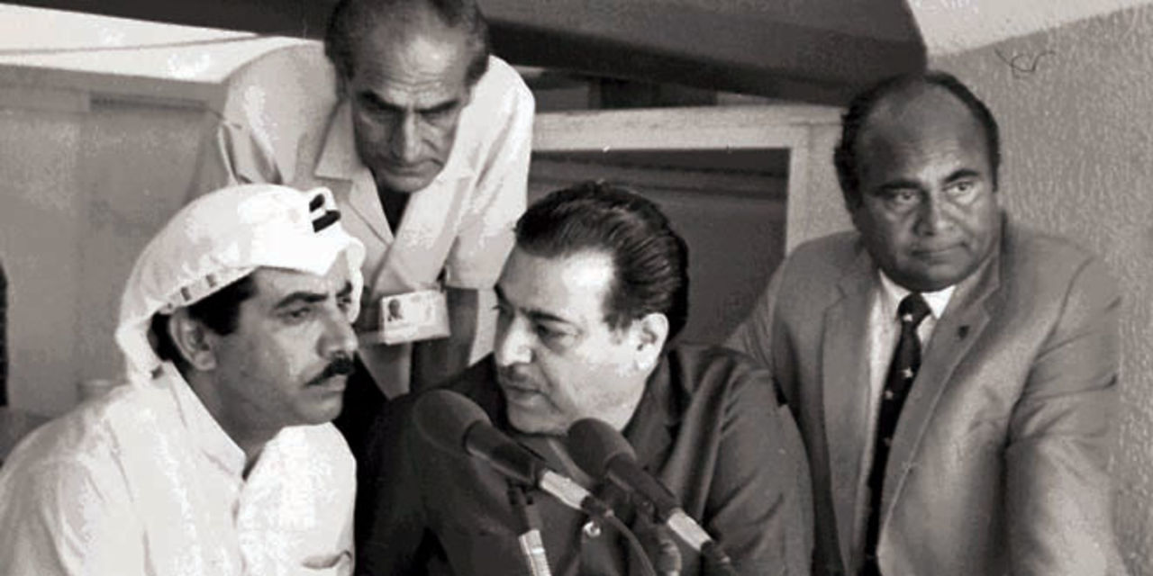 Munir Hussain (middle) during commentary