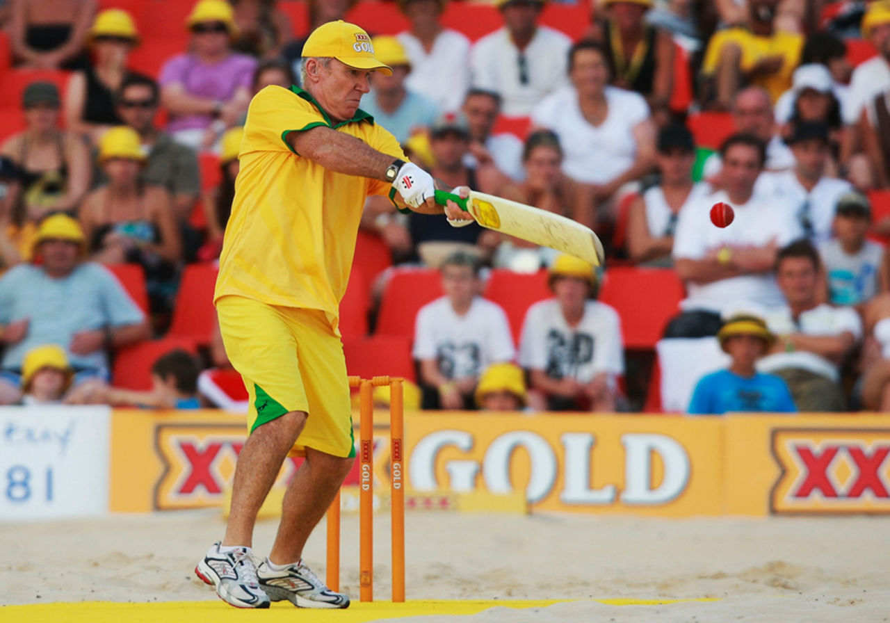 Allan Border slashes at one during the beach cricket tri-nations series at Maroubra beach in Sydney, January 12, 2008