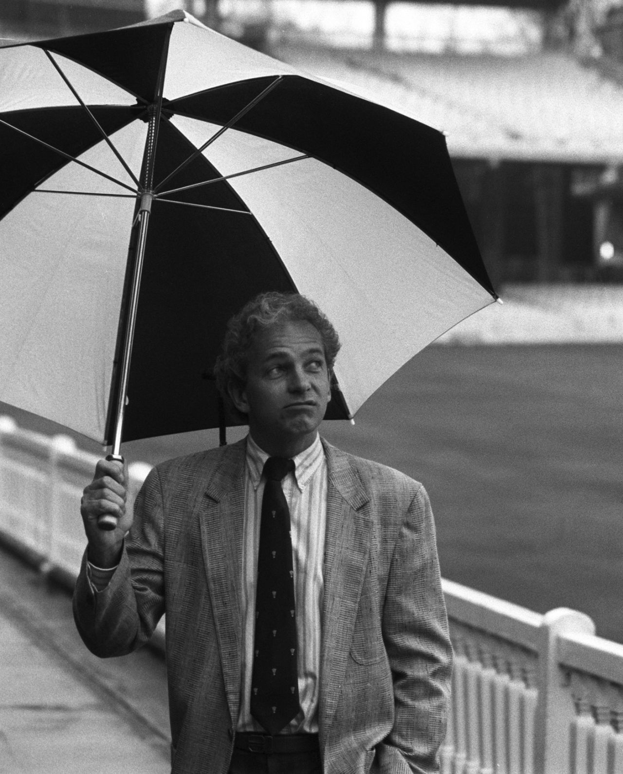 David Gower looks glumly at the rain during a press conference at Lord's, April 5, 1989