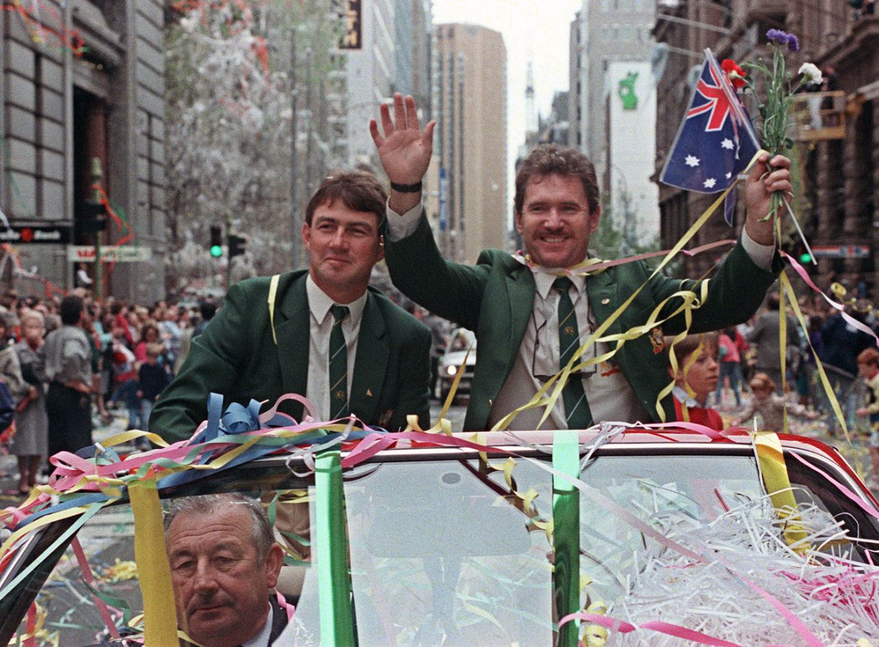 Geoff Marsh and Allan Border ride through a victory parade in Sydney celebrating Australia's first Ashes victory in England since 1975, September 28, 1989