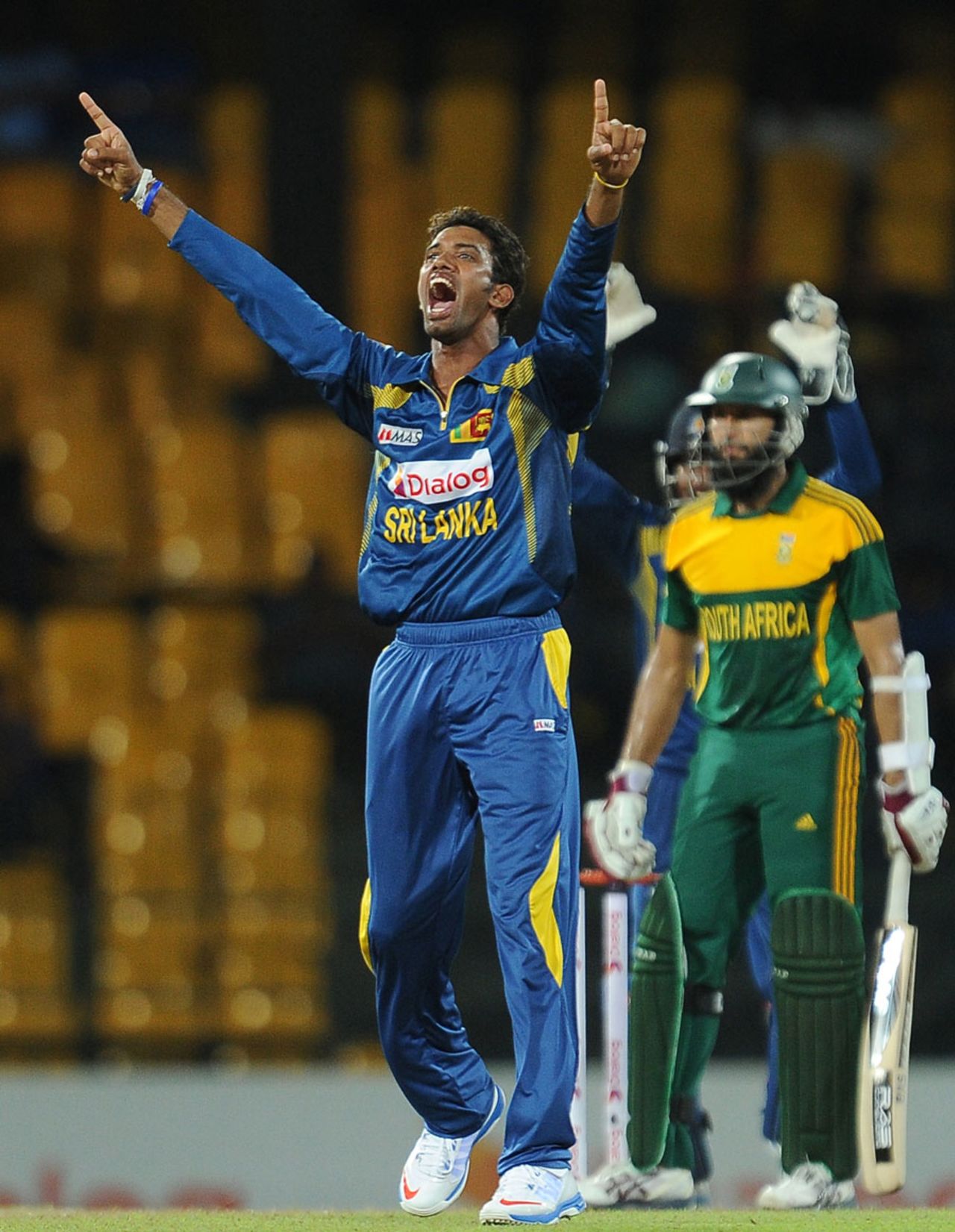 Sachithra Senanayake exults after picking up Hashim Amla, Sri Lanka v South Africa, 5th ODI, Colombo, July 31, 2013