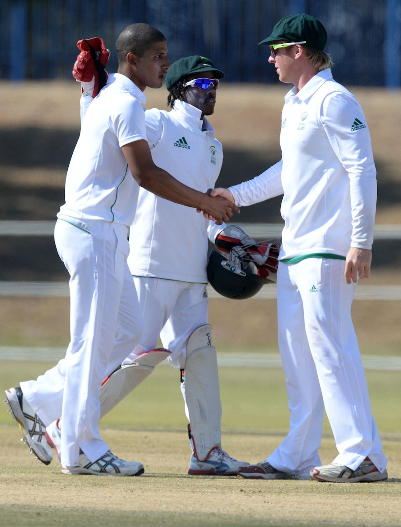 Beuran Hendricks is congratulated after taking five wickets, South Africa A v Australia A, 2nd unofficial Test, Day 1, Rustenberg, July 31, 2013