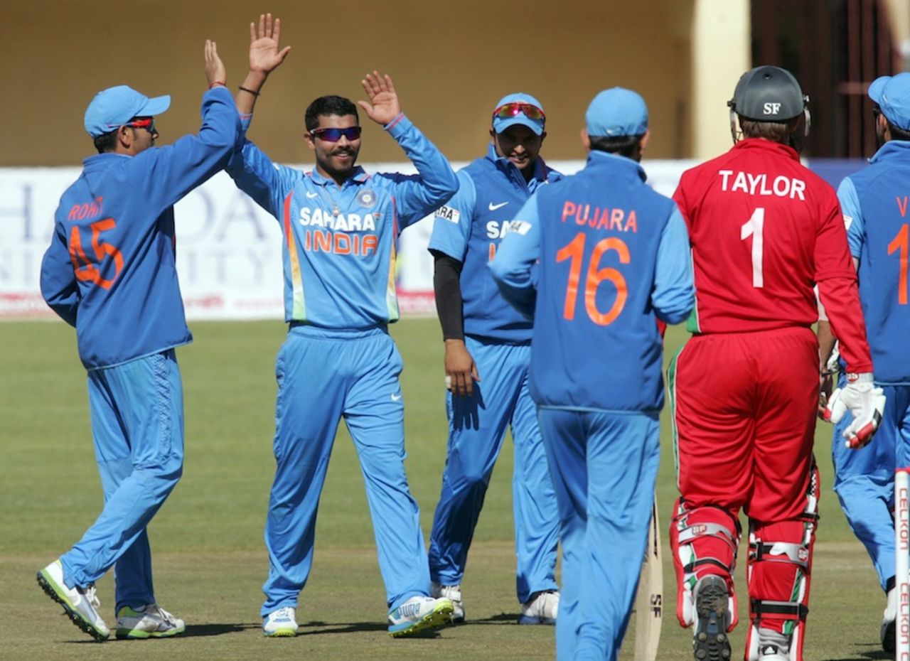 Ravindra Jadeja is congratulated after he dismissed Brendan Taylor, Zimbabwe v India, 4th ODI, Bulawayo, August 1, 2013