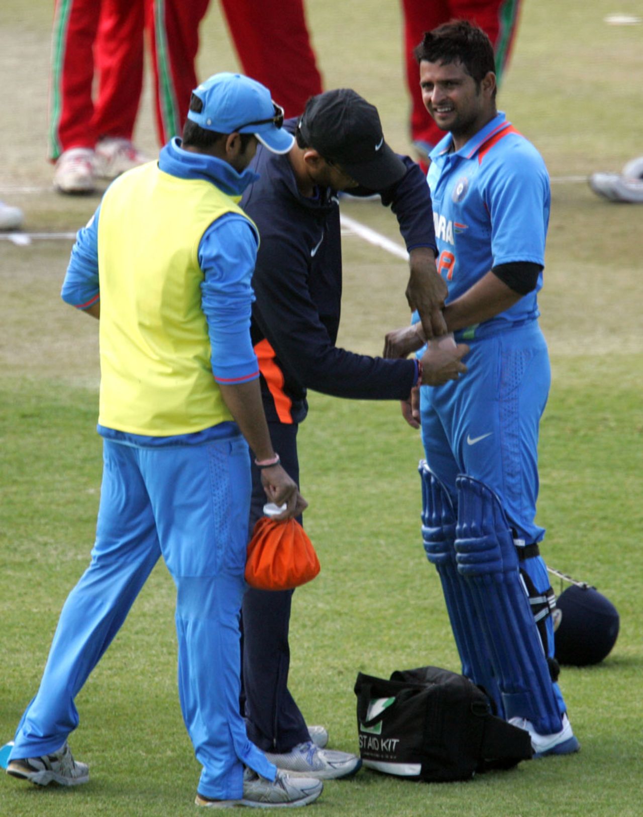 Suresh Raina has his wrists attended to, Zimbabwe v India, 4th ODI, Bulawayo, August 1, 2013