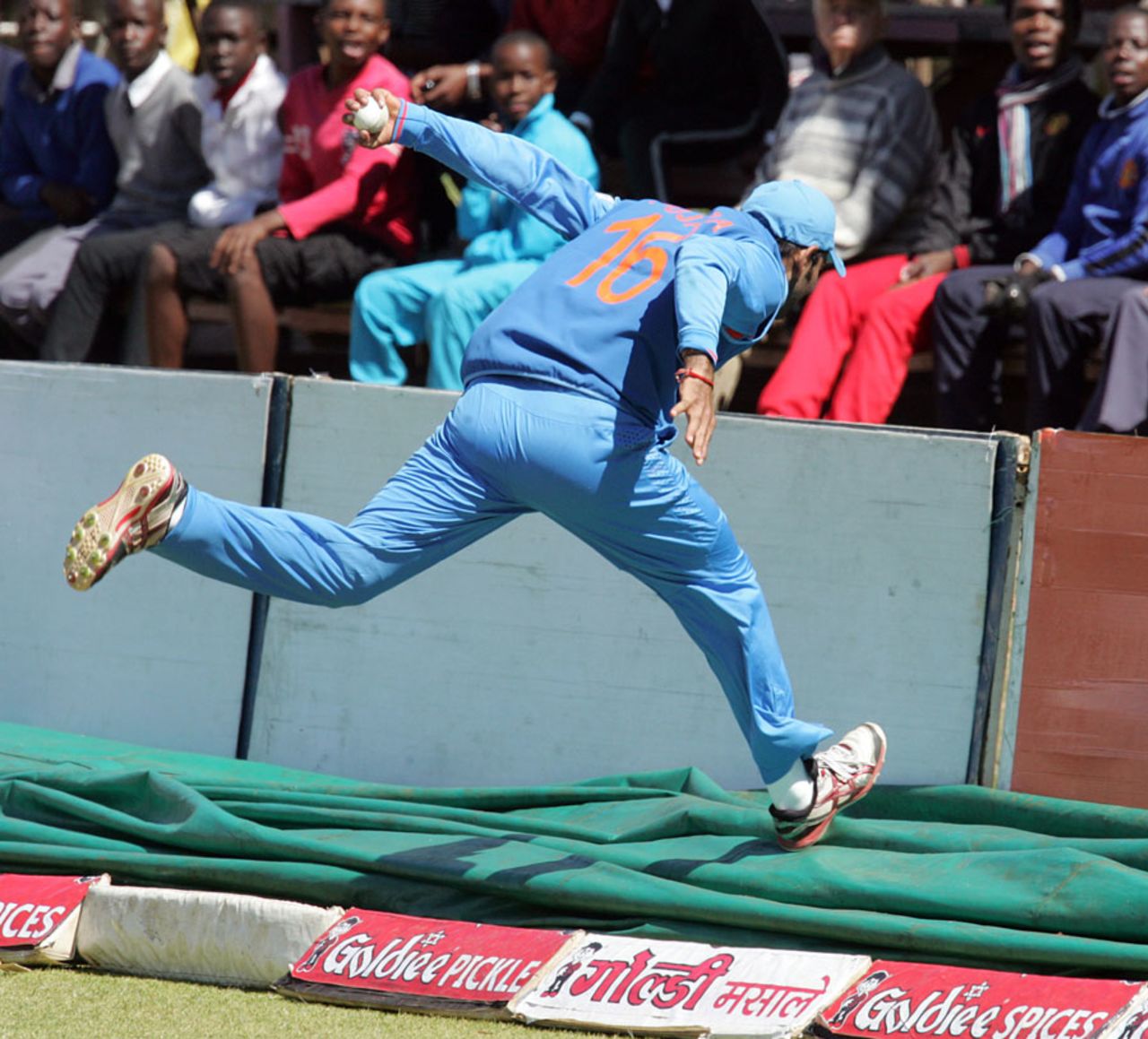 Cheteshwar Pujara unsuccessfully attempts to stop a six, Zimbabwe v India, 4th ODI, Bulawayo, August 1, 2013