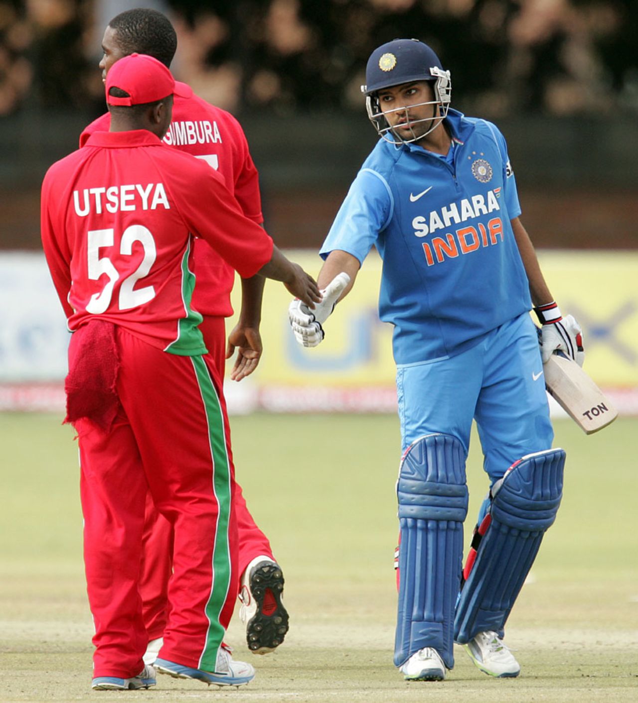 Rohit Sharma is congratulated after India's nine-wicket win, Zimbabwe v India, 4th ODI, Bulawayo, August 1, 2013 