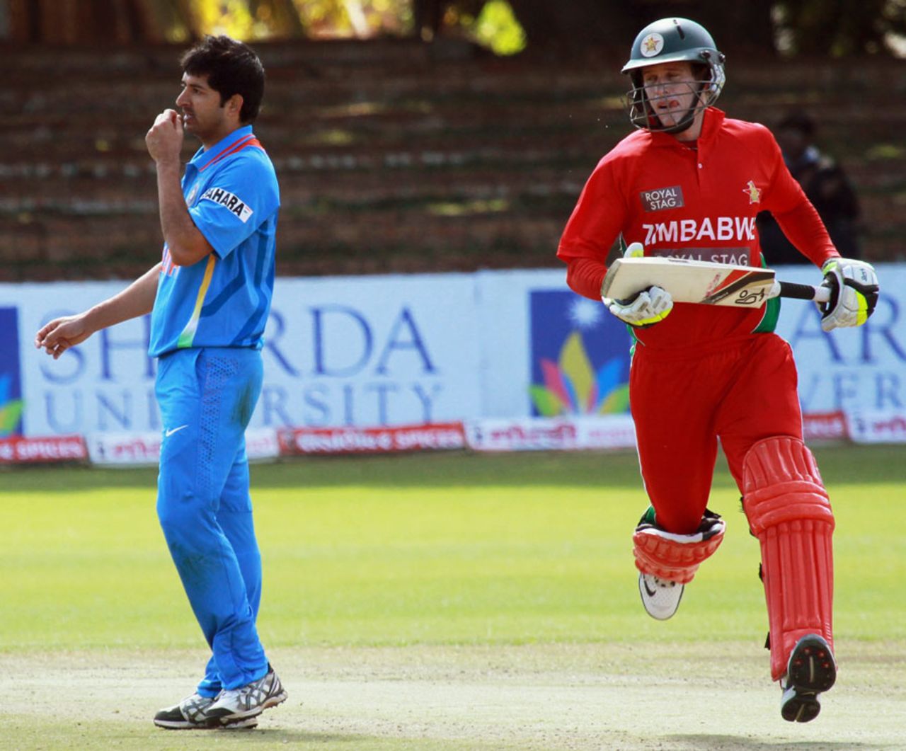 Malcolm Waller completes a run as Mohit Sharma looks on, Zimbabwe v India, 4th ODI, Bulawayo, August 1, 2013