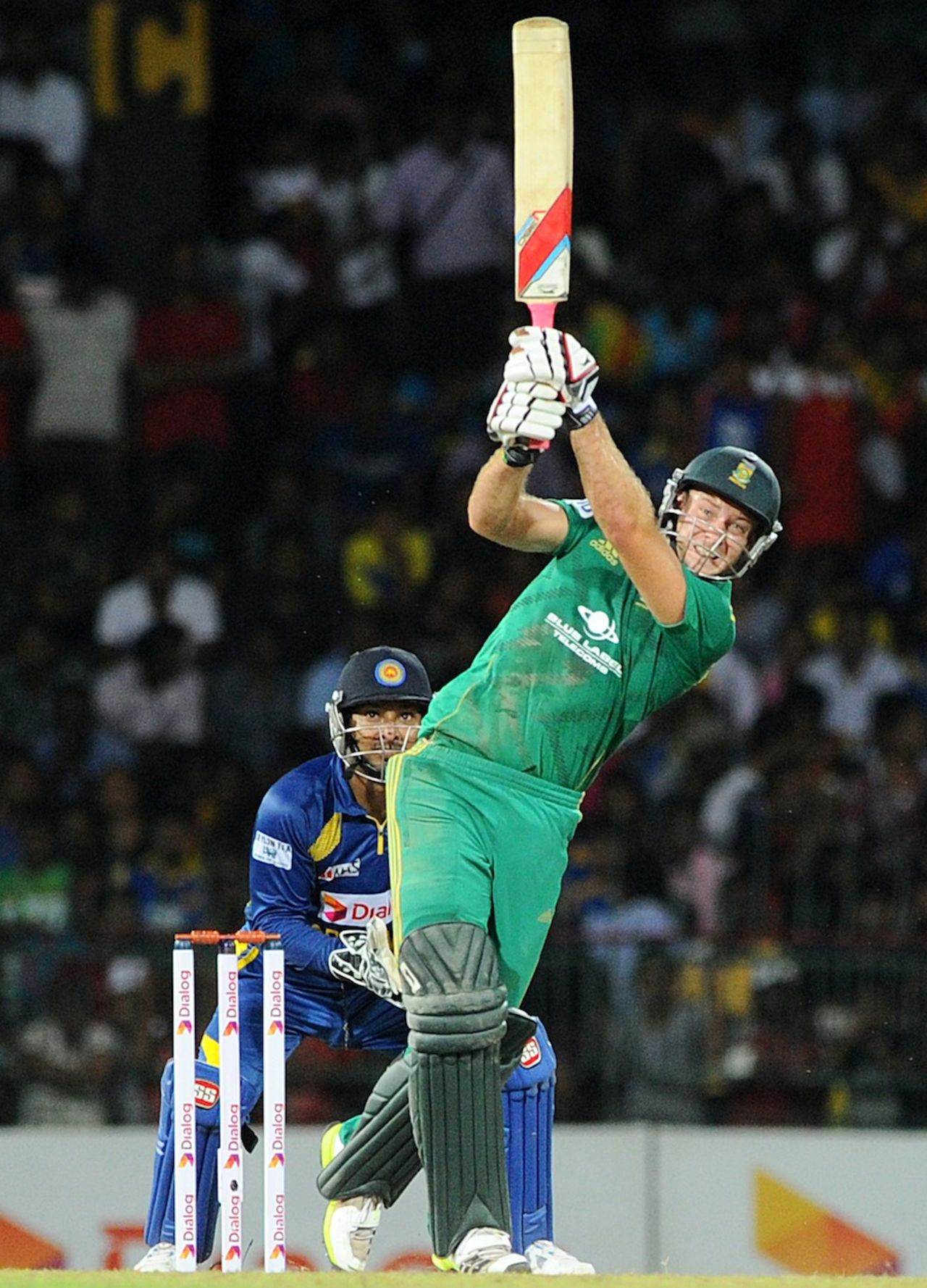 David Miller powers one down the ground, Sri Lanka v South Africa, 1st T20, Colombo, August 2, 2013