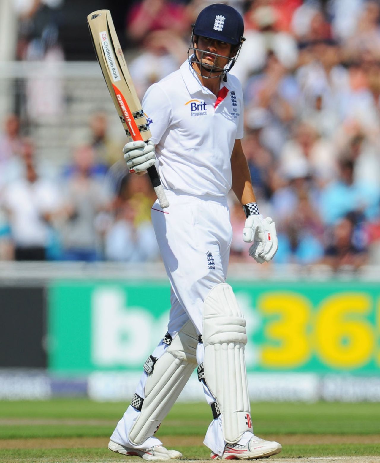 Alastair Cook acknowledges the applause after reaching his half-century, England v Australia, 3rd Investec Test, Old Trafford, 3rd day, August 3, 2013