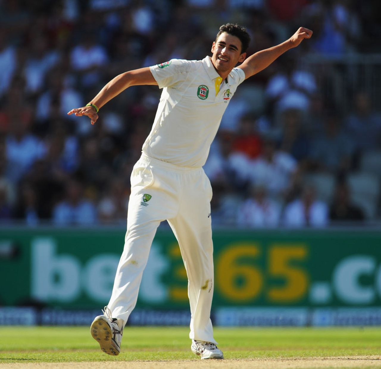 Mitchell Starc celebrates removing Kevin Pietersen, England v Australia, 3rd Investec Test, Old Trafford, 3rd day, August 3, 2013