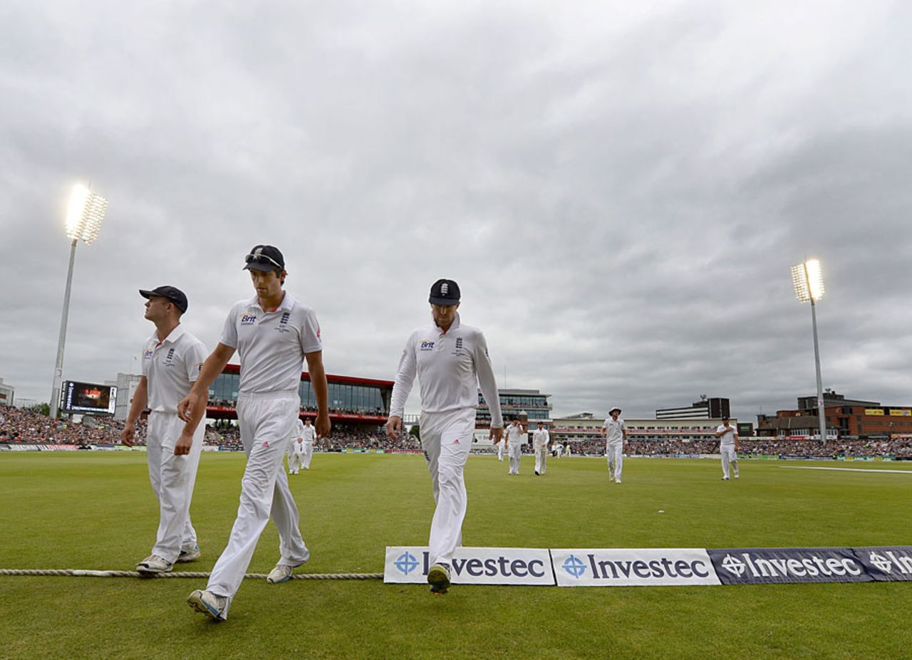The England players leave a gloomy Old Trafford, England v Australia, 3rd Investec Test, Old Trafford, 4th day, August 4, 2013