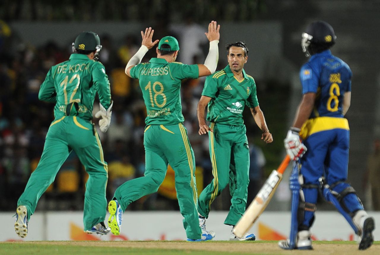 Imran Tahir is congratulated after picking up Kusal Perera's wicket, Sri Lanka v South Africa, 2nd T20I, Hambantota, August 4, 2013