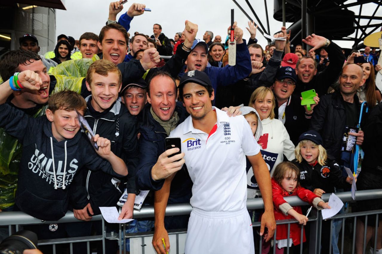 Alastair Cook poses for a photo with supporters, England v Australia, 3rd Investec Test, Old Trafford, 5th day, August 5, 2013