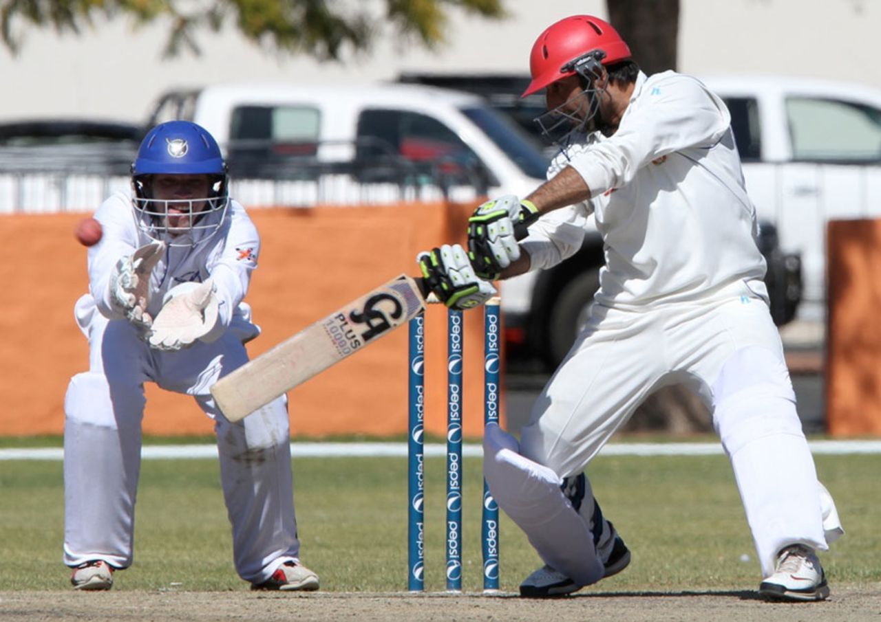 Asghar Stanikzai cuts to the off side, Namibia v Afghanistan, ICC Intercontinental Cup, 2nd day, Windhoek, August 5, 2013