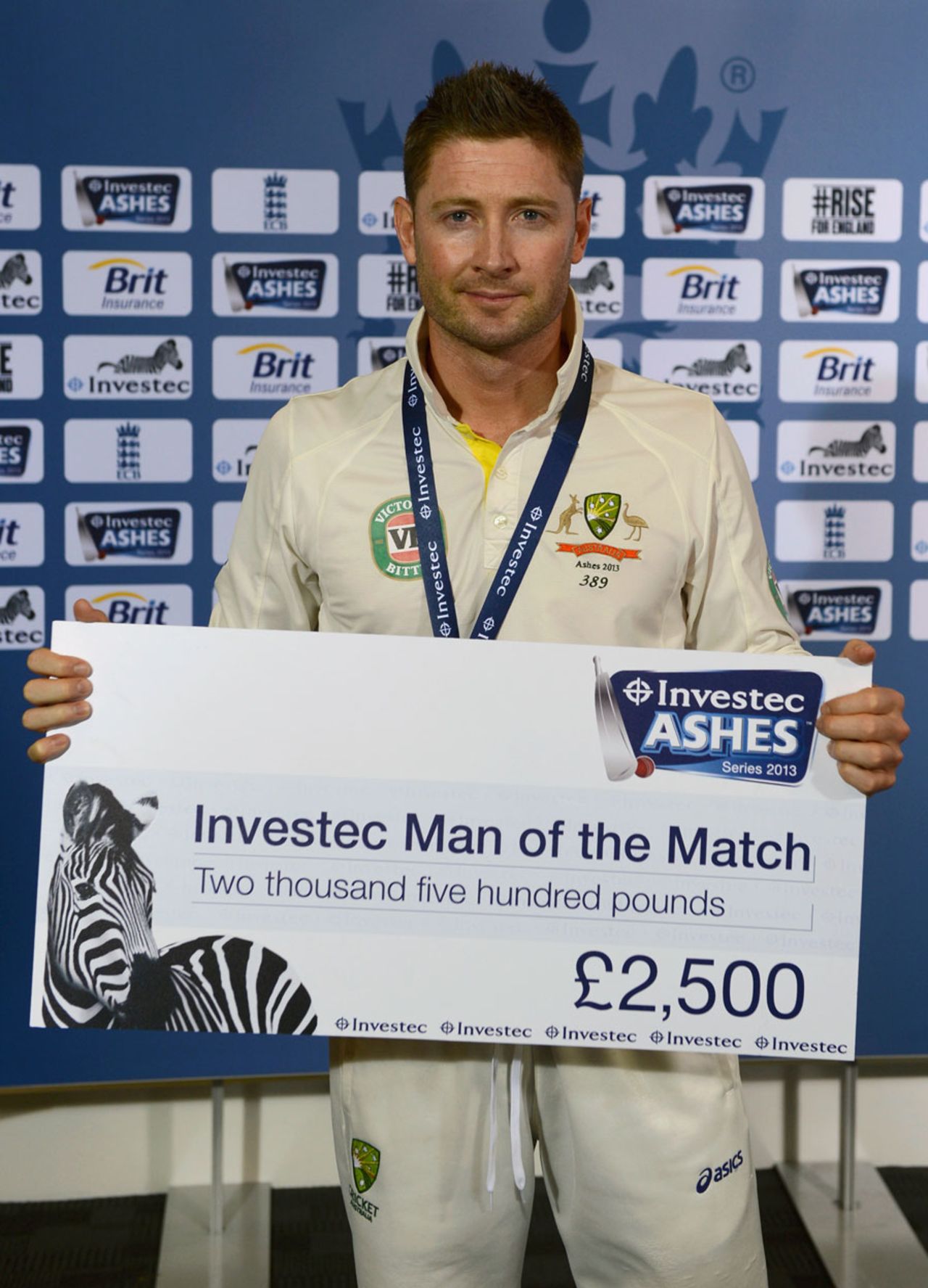 Michael Clarke with the Man-of-the-Match cheque, England v Australia, 3rd Investec Test, Old Trafford, 5th day, August 5, 2013