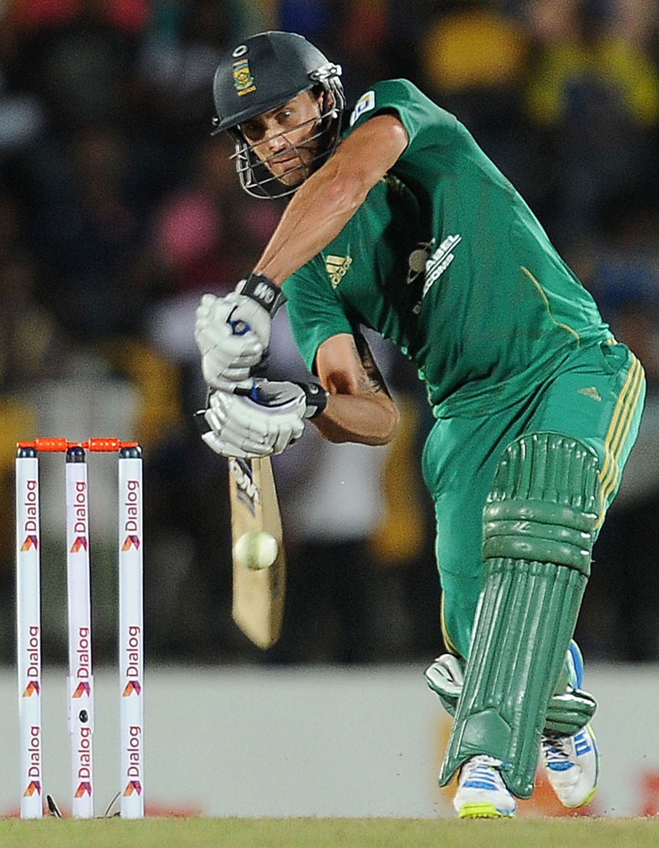 Faf du Plessis looks to chip it over the off side, Sri Lanka v South Africa, 3rd T20, Hambantota, August 6, 2013