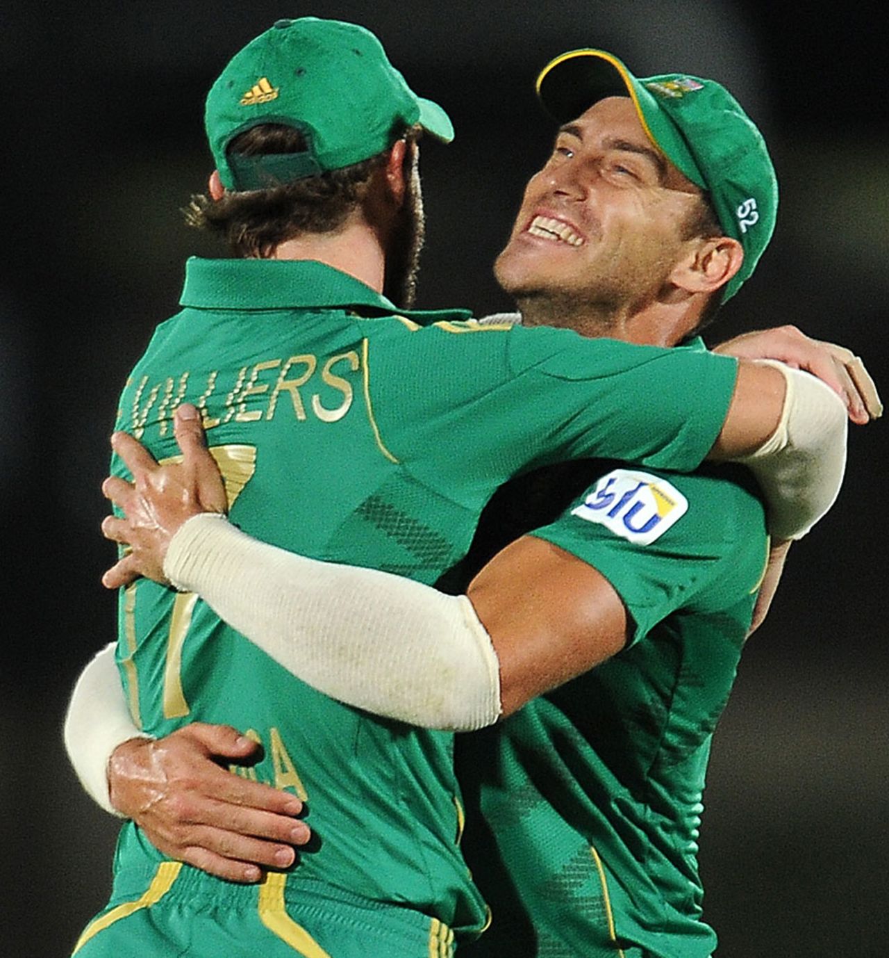 AB de Villiers and Faf du Plessis embrace after a wicket falls, Sri Lanka v South Africa, 3rd T20, Hambantota, August 6, 2013