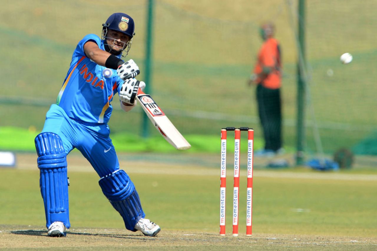 Suresh Raina hits the ball over the covers, South Africa A v India A, tri-series, Pretoria, August 9, 2013