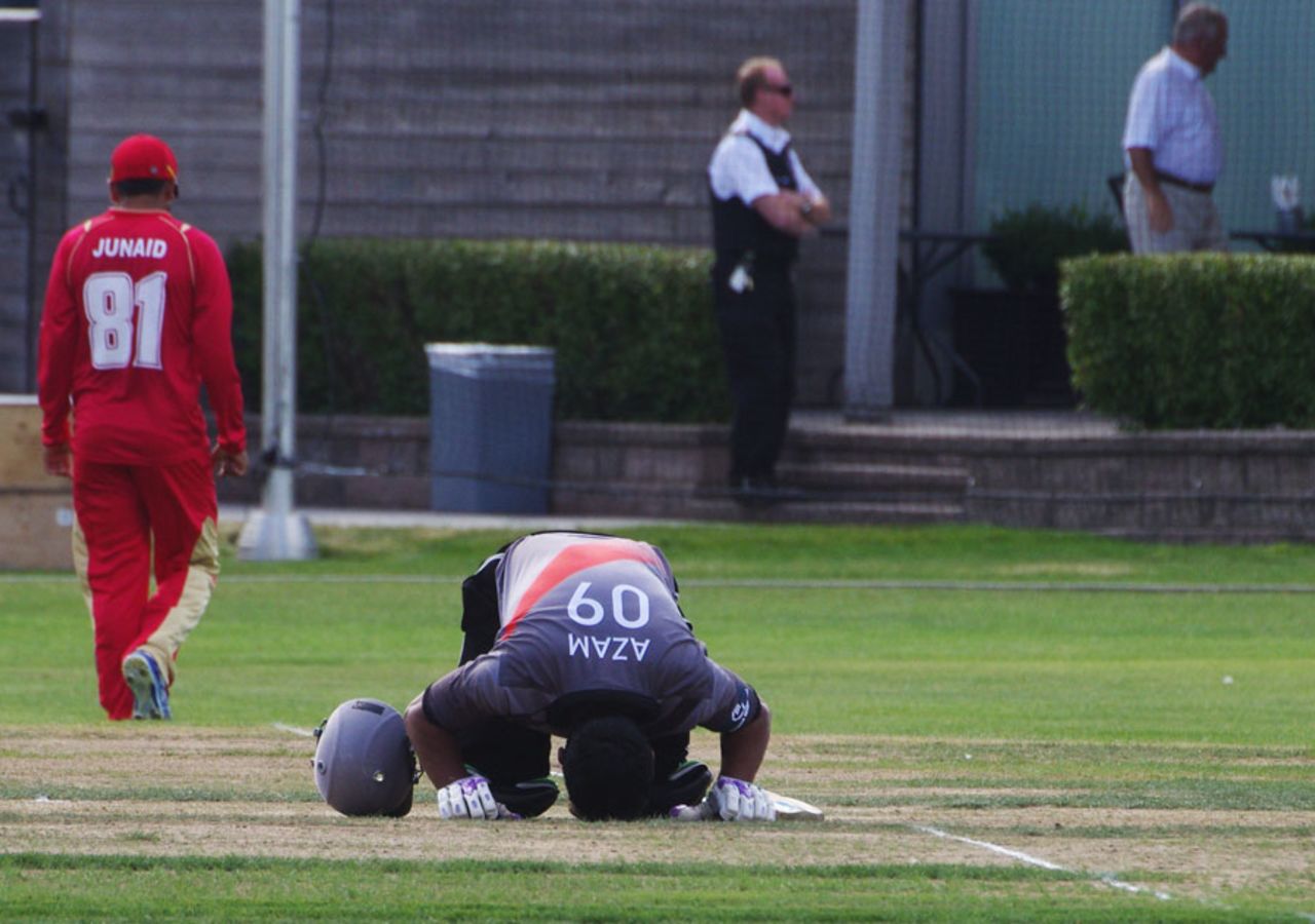 Mohammad Azam goes down on his knees after completing a half-century, Canada v United Arab Emirates, 1st T20, Toronto, August 10, 2013