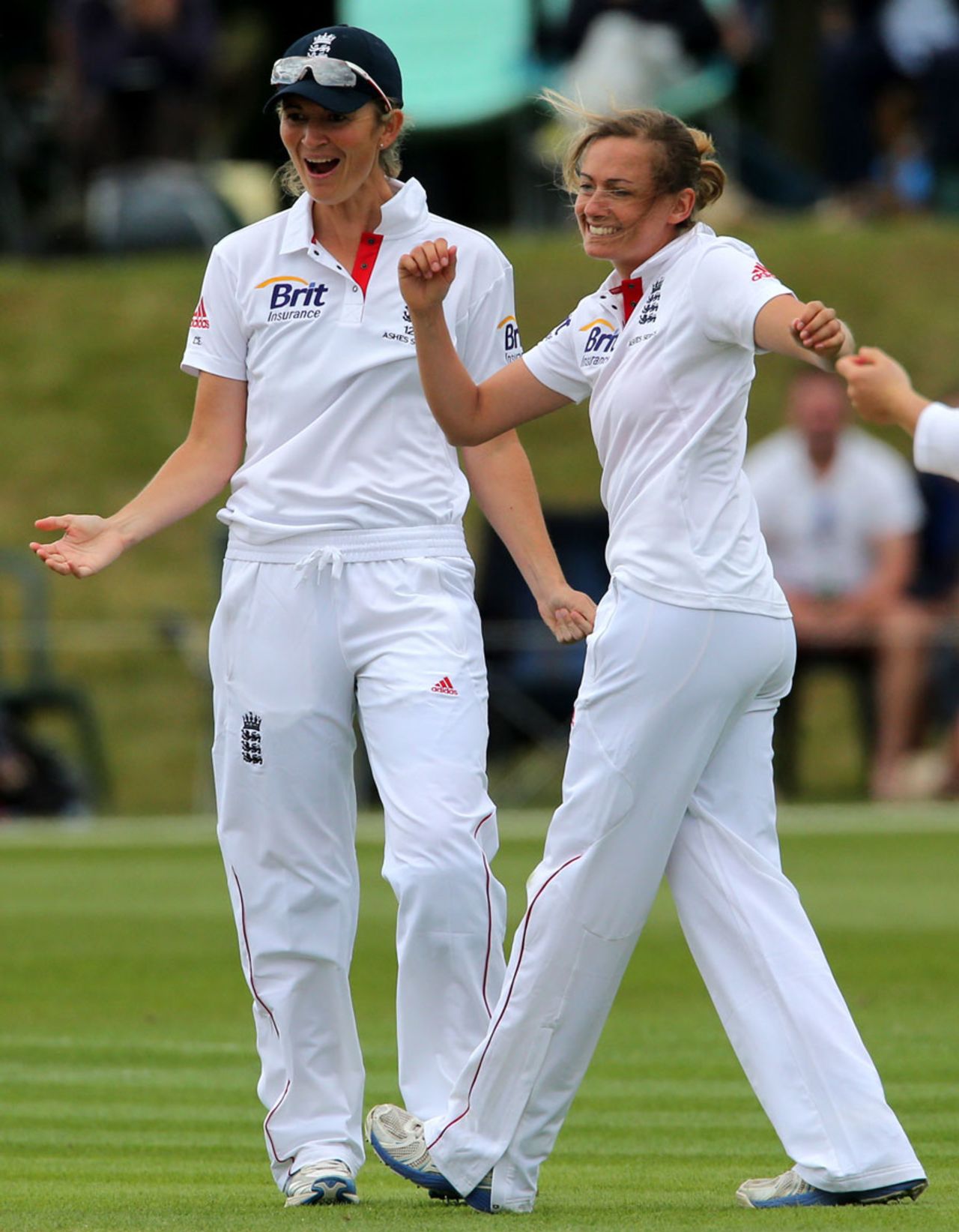 Charlotte Edwards and Laura Marsh celebrate a wicket, England Women v Australia Women, Only Test, 2nd day, Wormsley, August 12, 2013